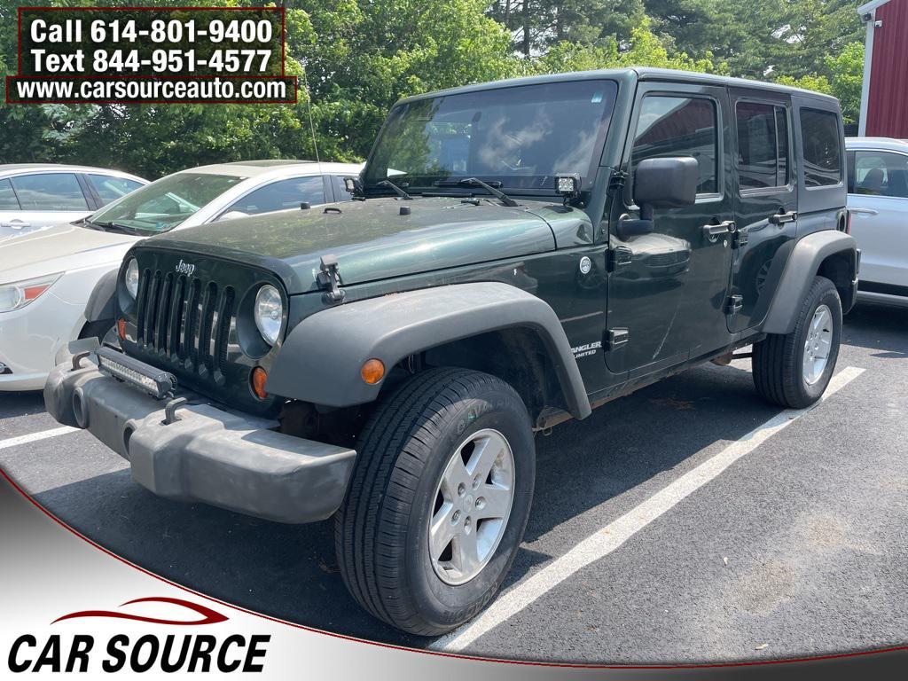used 2011 Jeep Wrangler Unlimited car, priced at $6,950