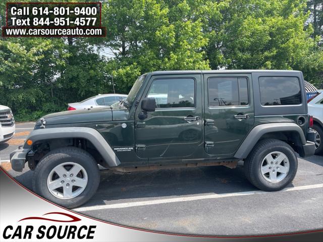 used 2011 Jeep Wrangler Unlimited car, priced at $5,995