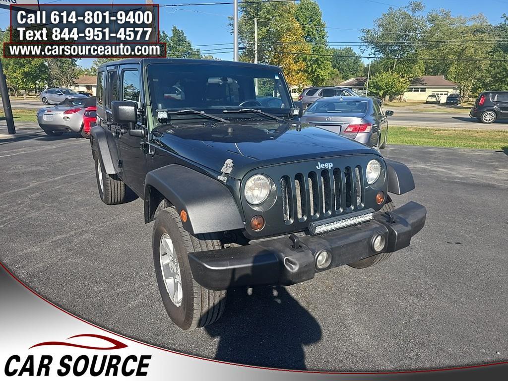 used 2011 Jeep Wrangler Unlimited car, priced at $5,950