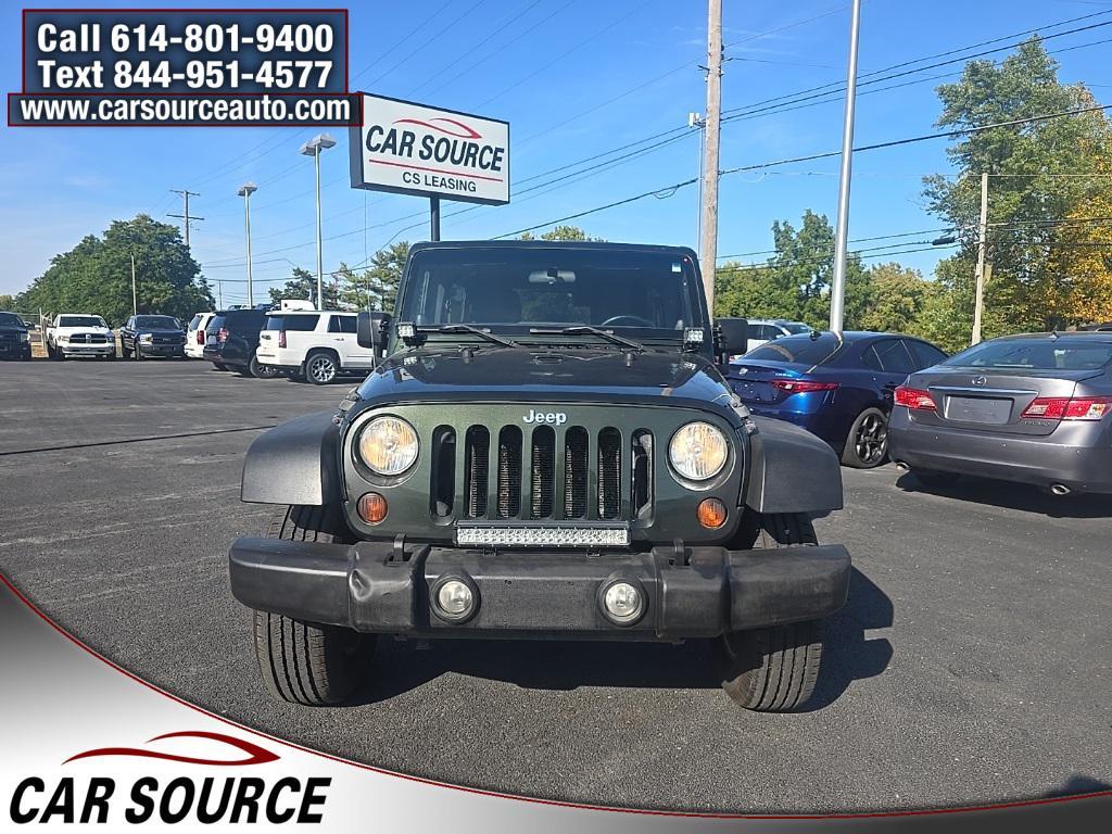 used 2011 Jeep Wrangler Unlimited car, priced at $5,950