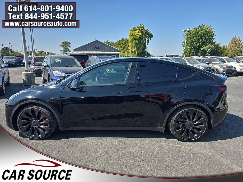 used 2023 Tesla Model Y car, priced at $30,450