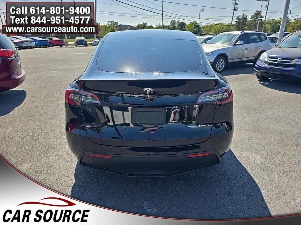 used 2023 Tesla Model Y car, priced at $30,450