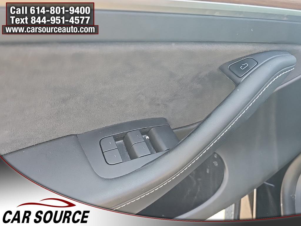 used 2023 Tesla Model Y car, priced at $30,450