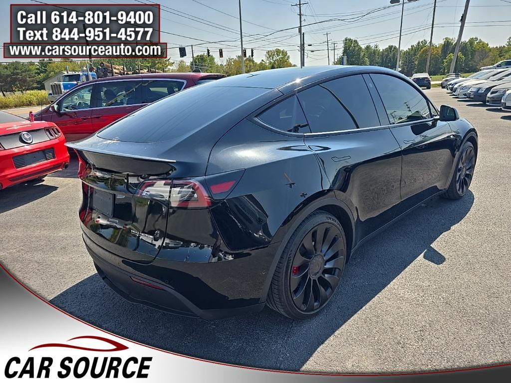 used 2023 Tesla Model Y car, priced at $30,450
