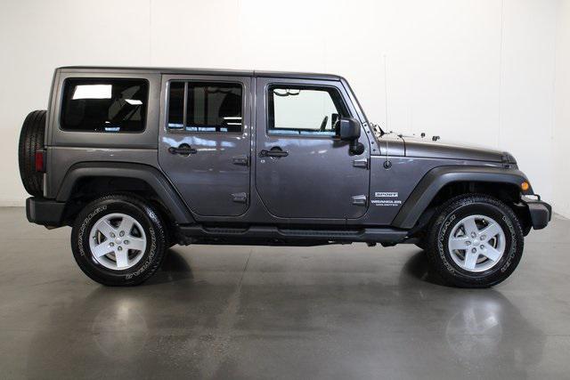 used 2014 Jeep Wrangler Unlimited car, priced at $16,920