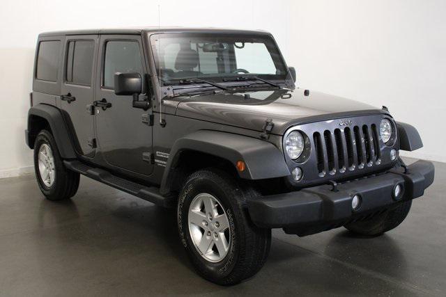 used 2014 Jeep Wrangler Unlimited car, priced at $16,920