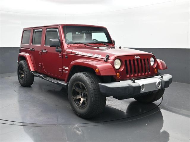 used 2012 Jeep Wrangler Unlimited car, priced at $12,994