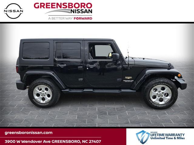 used 2014 Jeep Wrangler Unlimited car, priced at $18,647