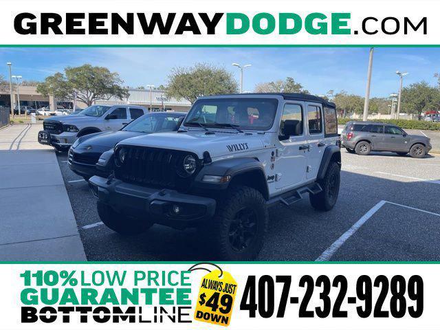 used 2021 Jeep Wrangler Unlimited car, priced at $34,678