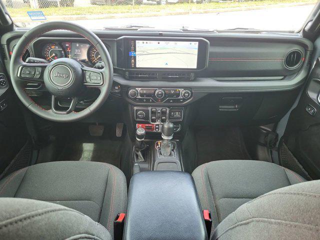 used 2024 Jeep Wrangler car, priced at $43,297
