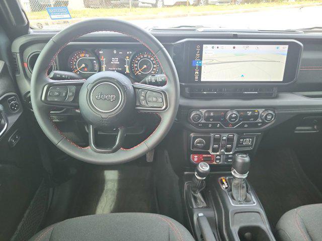 used 2024 Jeep Wrangler car, priced at $43,297