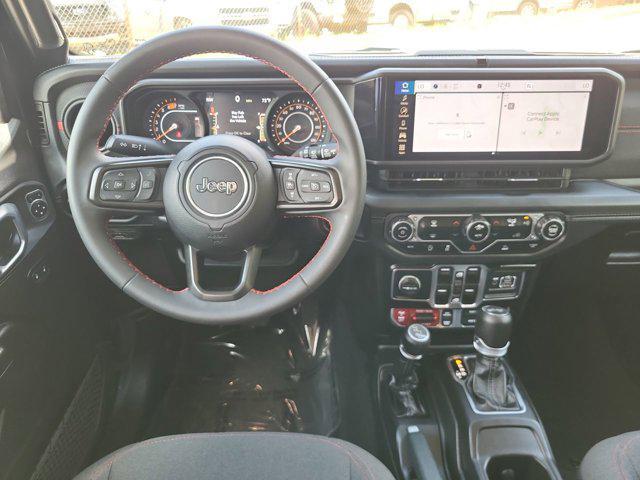 used 2024 Jeep Wrangler car, priced at $42,377