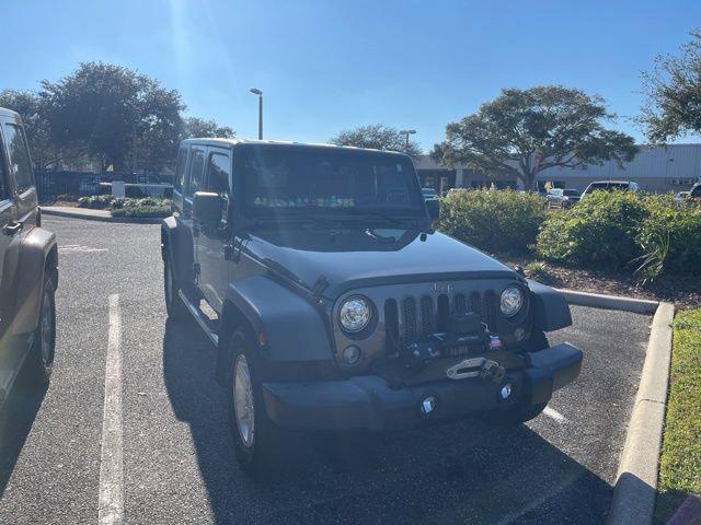 used 2017 Jeep Wrangler Unlimited car, priced at $23,771