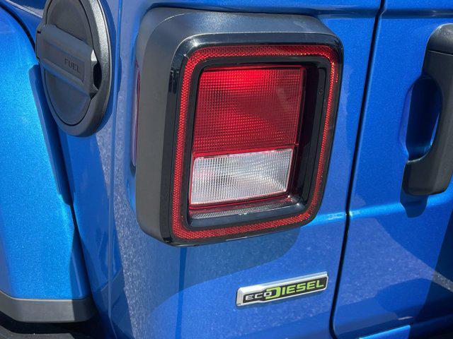 used 2021 Jeep Wrangler Unlimited car, priced at $30,592