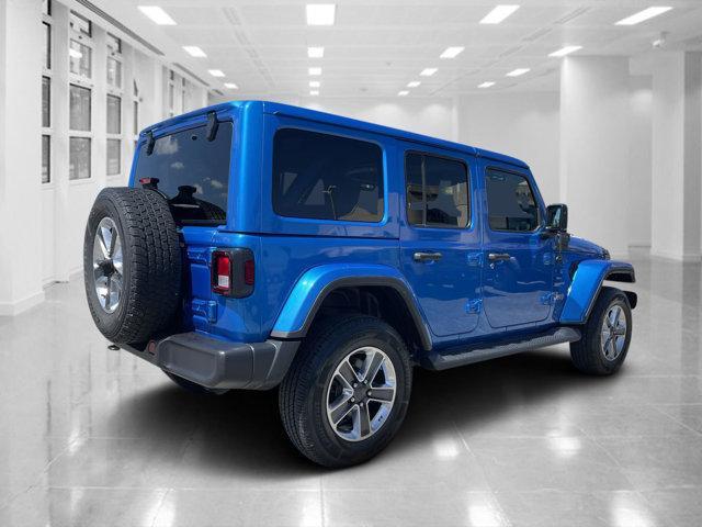 used 2021 Jeep Wrangler Unlimited car, priced at $30,592
