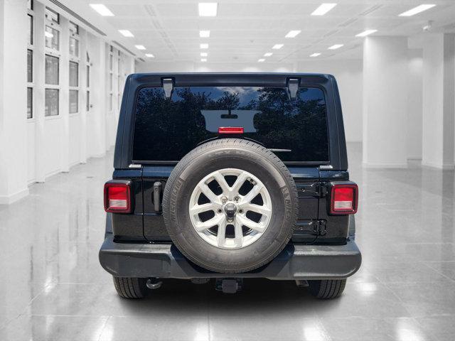 used 2023 Jeep Wrangler car, priced at $32,956