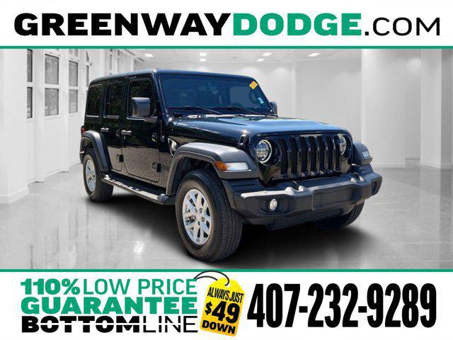 used 2023 Jeep Wrangler car, priced at $32,956