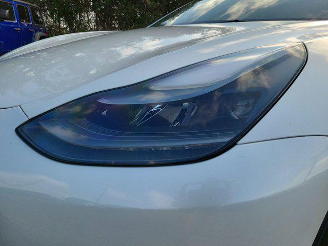 used 2022 Tesla Model 3 car, priced at $27,122