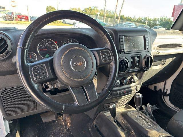 used 2015 Jeep Wrangler Unlimited car, priced at $17,815