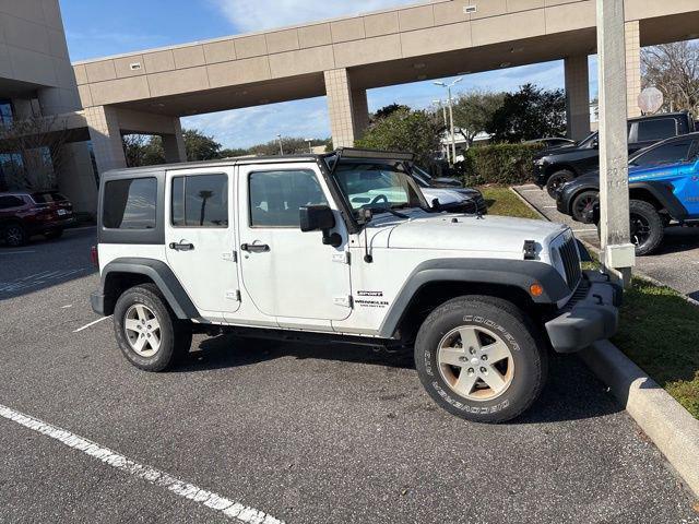 used 2015 Jeep Wrangler Unlimited car, priced at $17,815