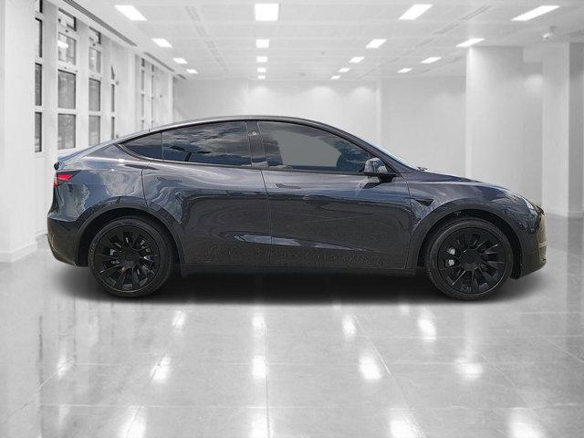 used 2024 Tesla Model Y car, priced at $33,418