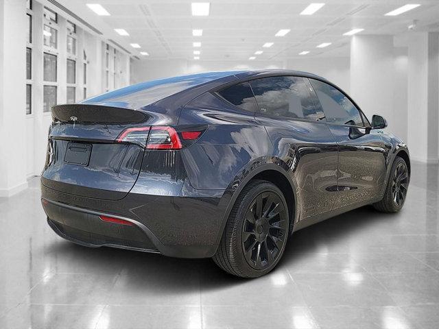 used 2024 Tesla Model Y car, priced at $33,418