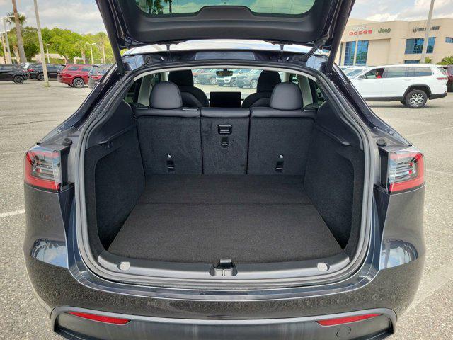 used 2024 Tesla Model Y car, priced at $33,418
