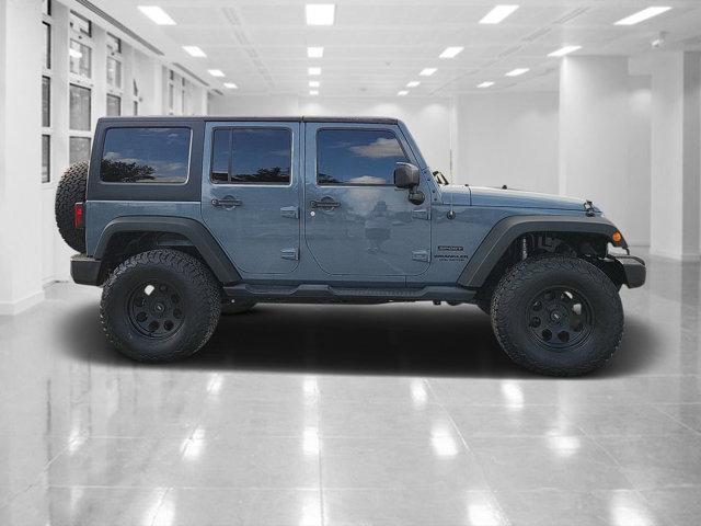 used 2015 Jeep Wrangler Unlimited car, priced at $21,611