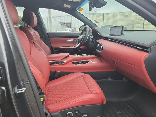 used 2023 Genesis GV70 car, priced at $43,922