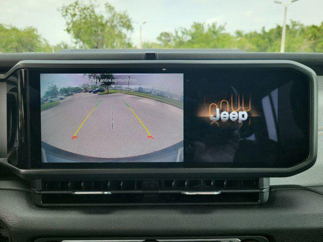 used 2024 Jeep Wrangler 4xe car, priced at $33,839