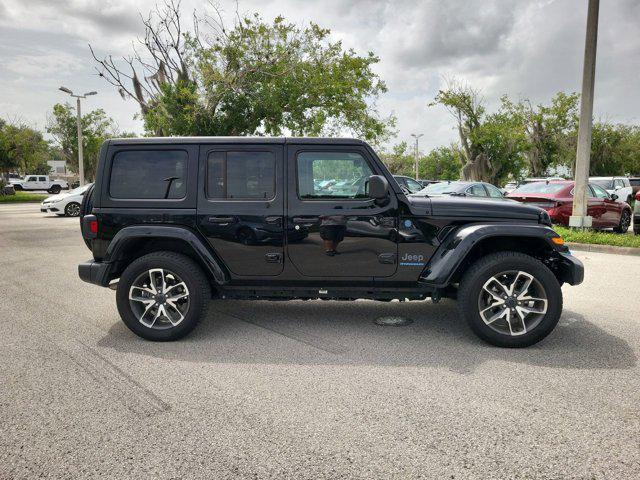 used 2024 Jeep Wrangler 4xe car, priced at $33,839