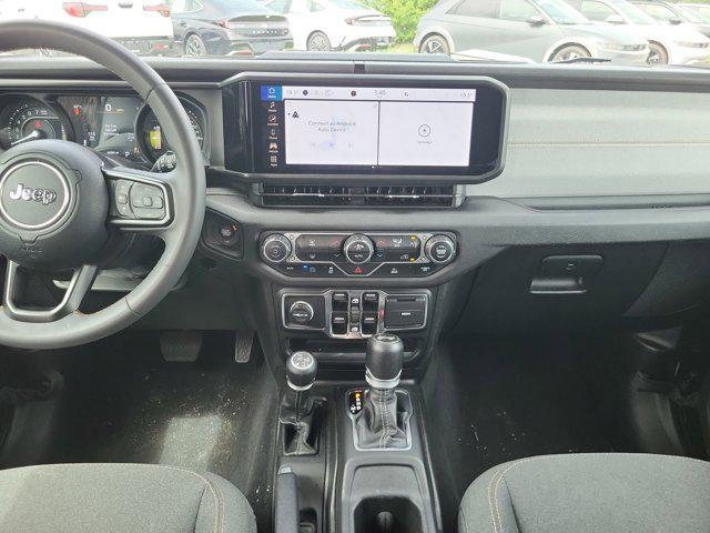 used 2024 Jeep Wrangler 4xe car, priced at $33,839
