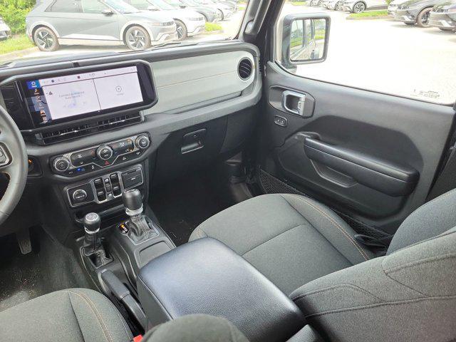 used 2024 Jeep Wrangler 4xe car, priced at $33,839