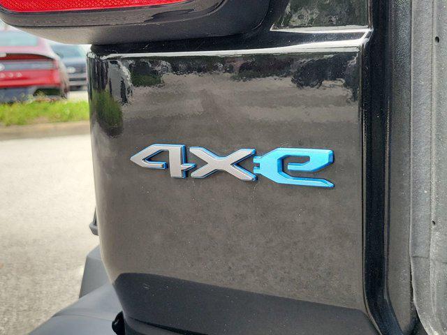 used 2024 Jeep Wrangler 4xe car, priced at $33,839