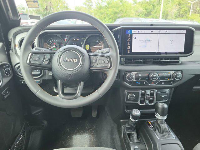 used 2024 Jeep Wrangler 4xe car, priced at $33,839