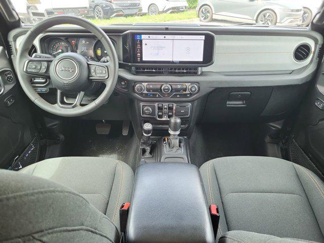 used 2024 Jeep Wrangler 4xe car, priced at $33,839