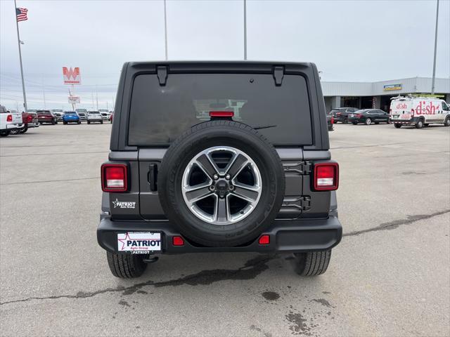 used 2021 Jeep Wrangler Unlimited car, priced at $34,198