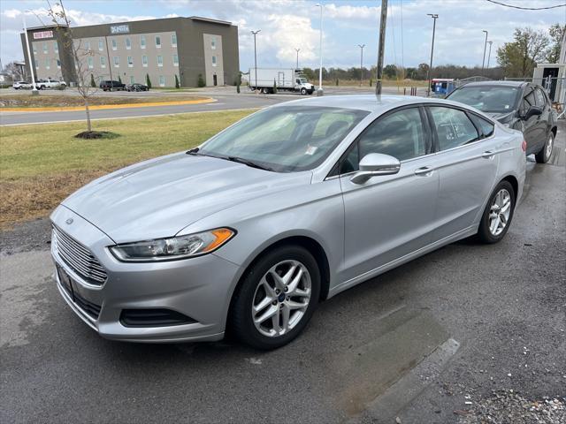 used 2014 Ford Fusion car, priced at $10,000