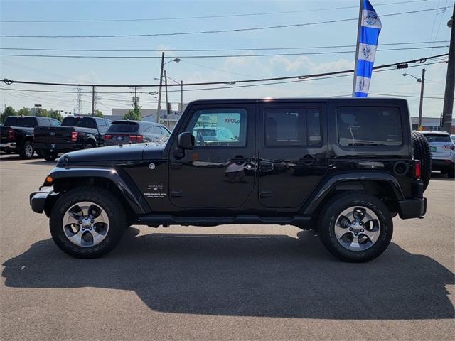 used 2016 Jeep Wrangler Unlimited car, priced at $16,994