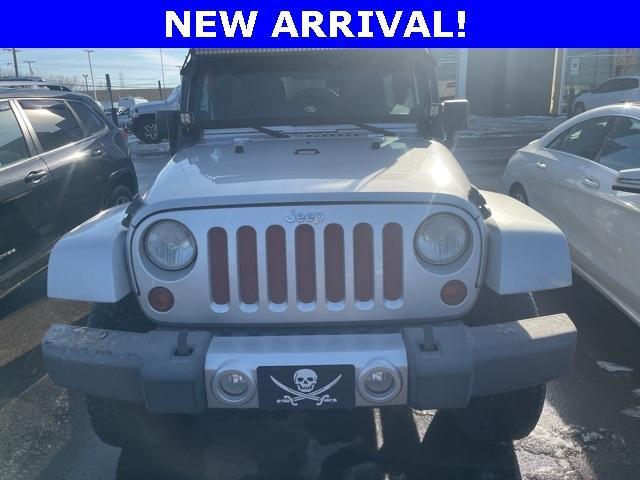 used 2012 Jeep Wrangler Unlimited car, priced at $15,994