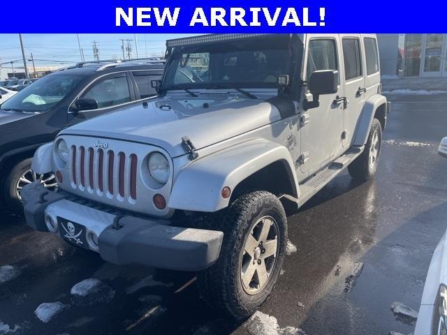 used 2012 Jeep Wrangler Unlimited car, priced at $15,994