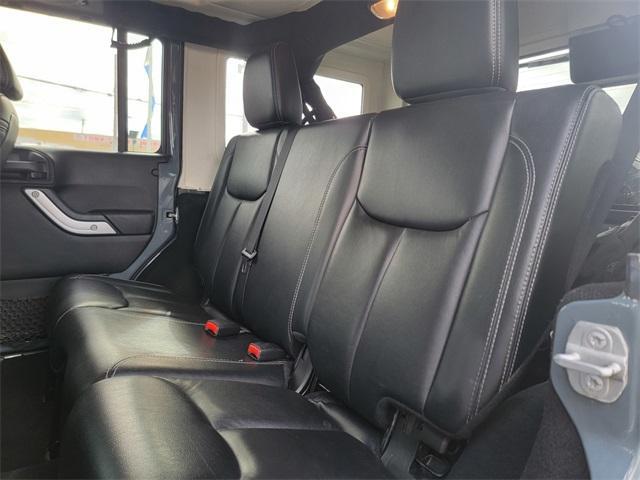 used 2014 Jeep Wrangler Unlimited car, priced at $21,955