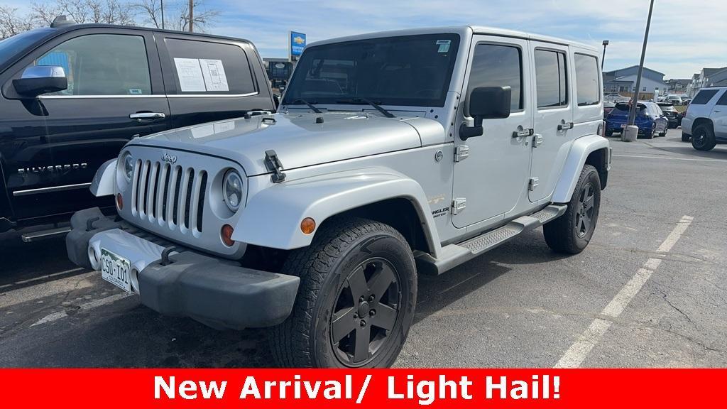used 2012 Jeep Wrangler Unlimited car, priced at $16,199
