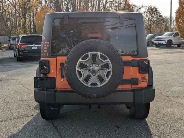 used 2013 Jeep Wrangler Unlimited car, priced at $23,998