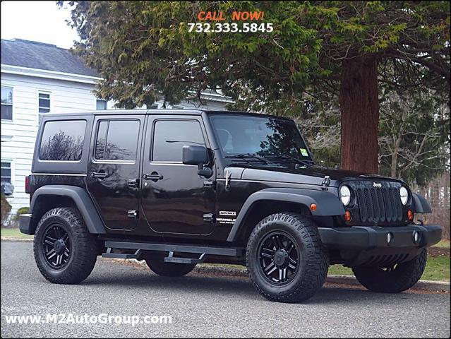 used 2012 Jeep Wrangler Unlimited car, priced at $14,000