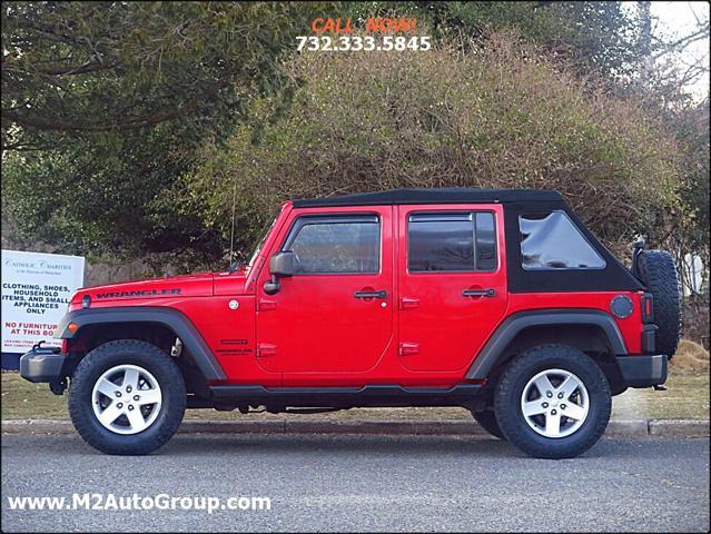 used 2014 Jeep Wrangler Unlimited car, priced at $12,900
