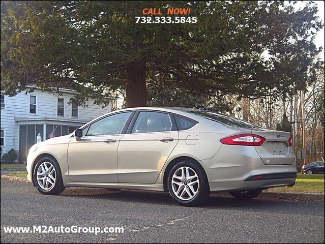 used 2015 Ford Fusion car, priced at $5,900