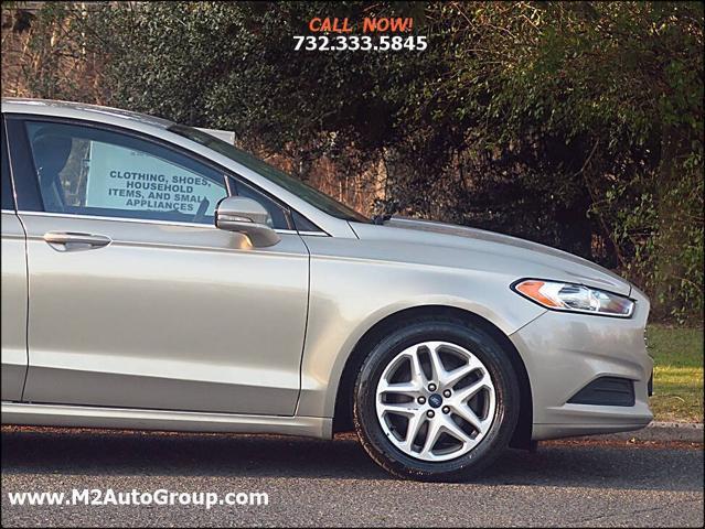 used 2015 Ford Fusion car, priced at $5,900