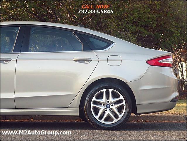 used 2015 Ford Fusion car, priced at $5,900