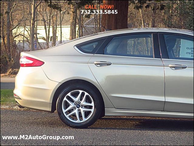 used 2015 Ford Fusion car, priced at $5,900